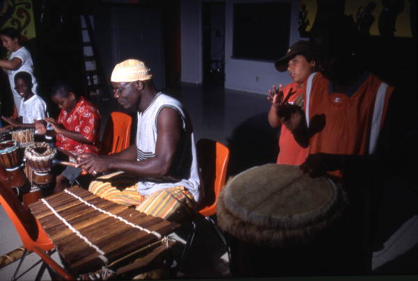 Martin Zagbo plays instruments with children at Lake Westen Elementary School - Orlando, Florida.