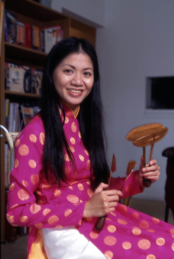 Tina Nguyen, Vietnamese musician with her musical instruments - Orlando, Florida.
