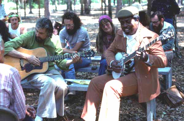 Johnny Shines (R) playing banjo with folksinger/guitarist Guy Carawan at the Portable Folk Festival - White Springs, Florida