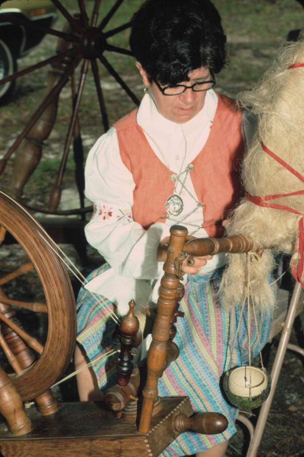Anne Lunestad spinning flax at the 1977 Florida Folk Festival - White Springs, Florida