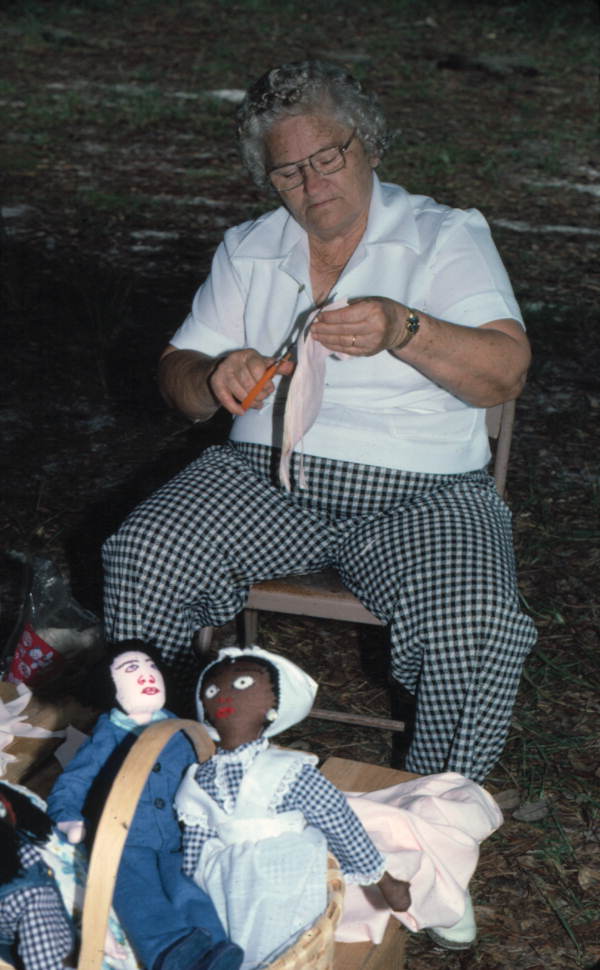Bertha Burnham making clothes for dolls at the 1977 Florida Folk Festival - White Springs, Florida