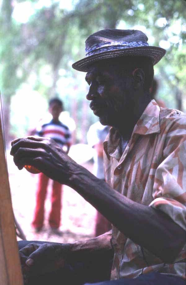 Moses Williams playing the diddley bow at the 1978 Florida Folk Festival