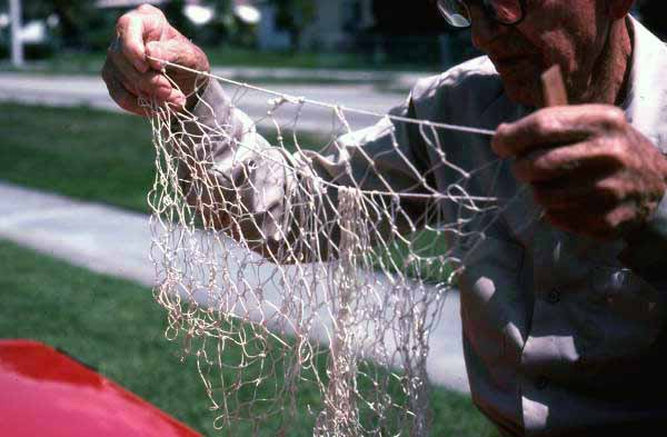 Valley Hill making a cast net