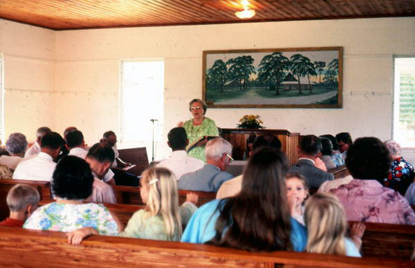 Woman leading Sacred Harp singing at the Bethlehem Primitive Baptist Church - Old Chicora, Florida