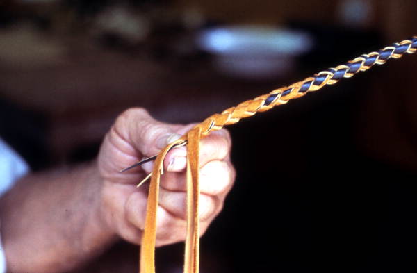 Claude Sheppard braiding a whip - Gainesville, Florida.