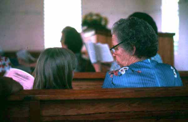 Grandmother and child in attendance at the Bethlehem Primitive Baptist Church - Old Chicora, Florida