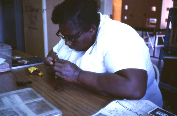 Mrs. Wells making a doll - Miami, Florida.