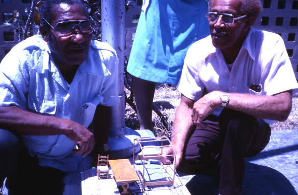 Mr. Ellis and Mr. Lee with a table and chair they made - Miami, Florida.