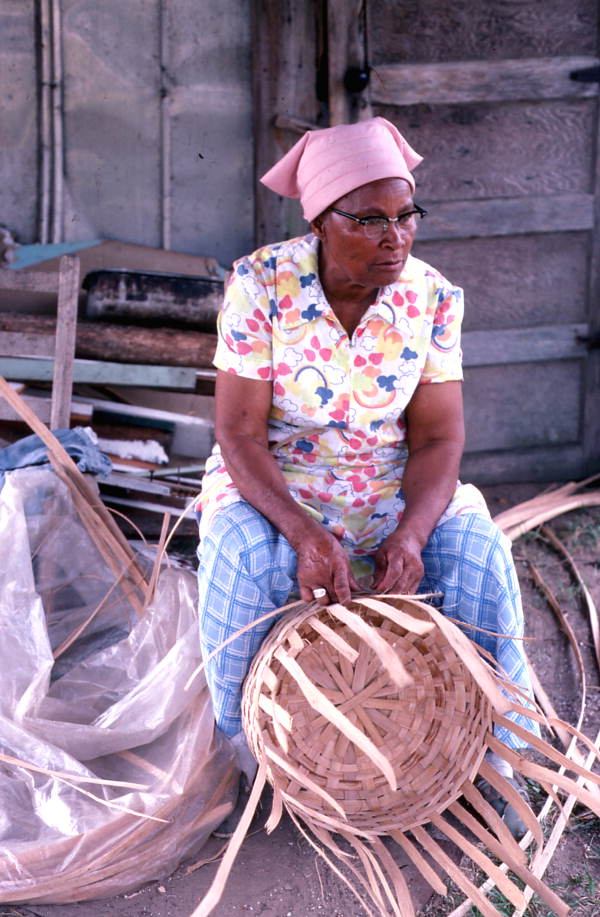 Lucreaty Clark weaving a white oak basket