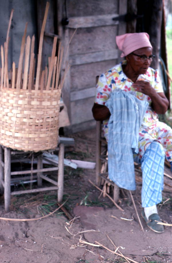 Lucreaty Clark taking a break from making a white oak basket