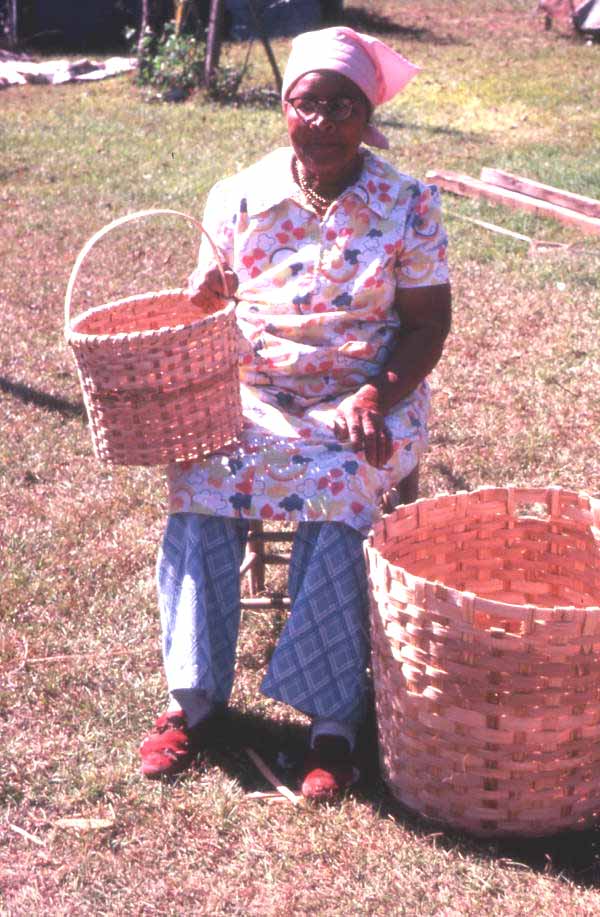 Lucreaty Clark with the white oak baskets she made