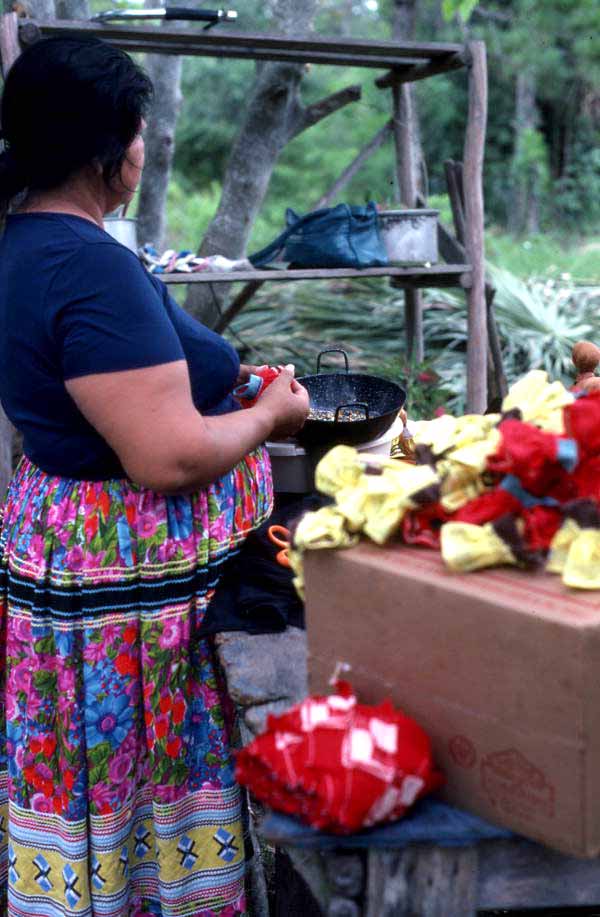 Mary Billie adding finishing touches to dolls - Big Cypress Seminole Indian Reservation