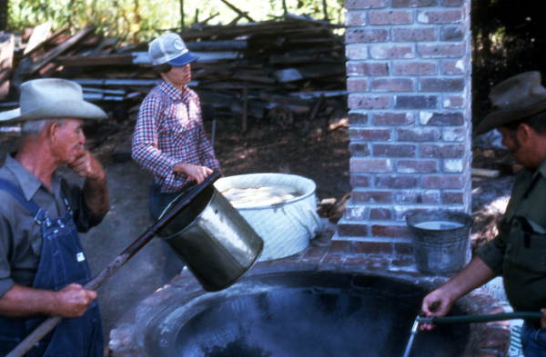 Cooking sugar cane juice into syrup - Orlando, Florida.