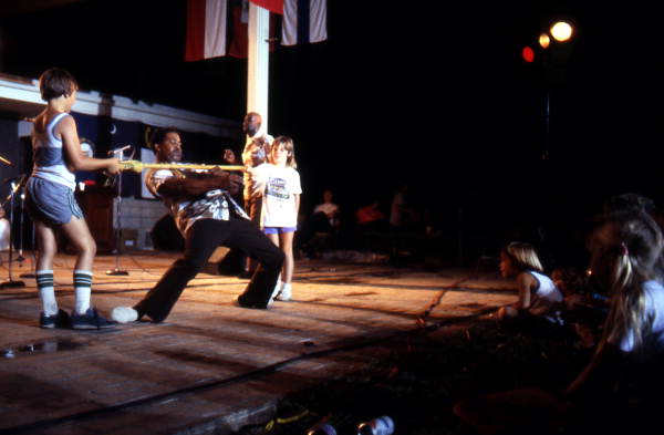 Member of the Junkanoos limbo dancing - White Springs, Florida