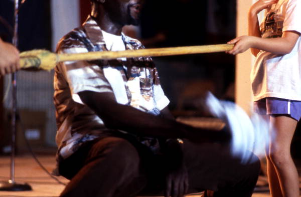 Member of the Junkanoos limbo dancing - White Springs, Florida