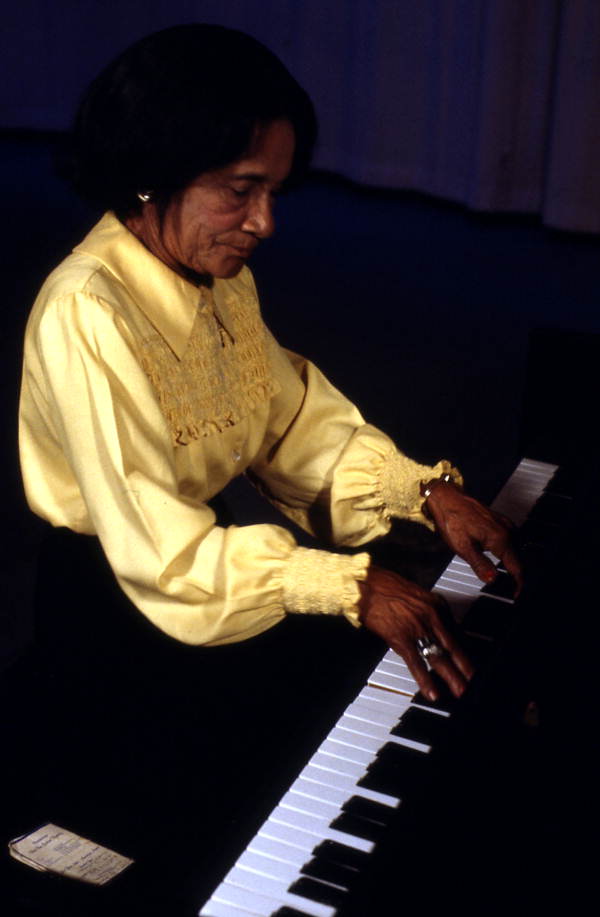 Ida Goodson playing piano during a recording session - Pensacola, Florida.