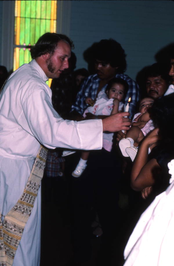 Chuck Bard performing a baptismal ceremony - Seville, Florida