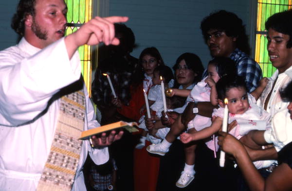 Chuck Bard performing a baptismal ceremony - Seville, Florida