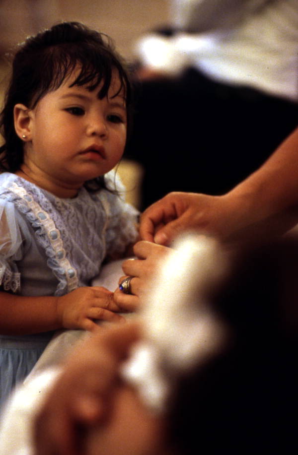 Young girl observing church proceedings - Seville, Florida
