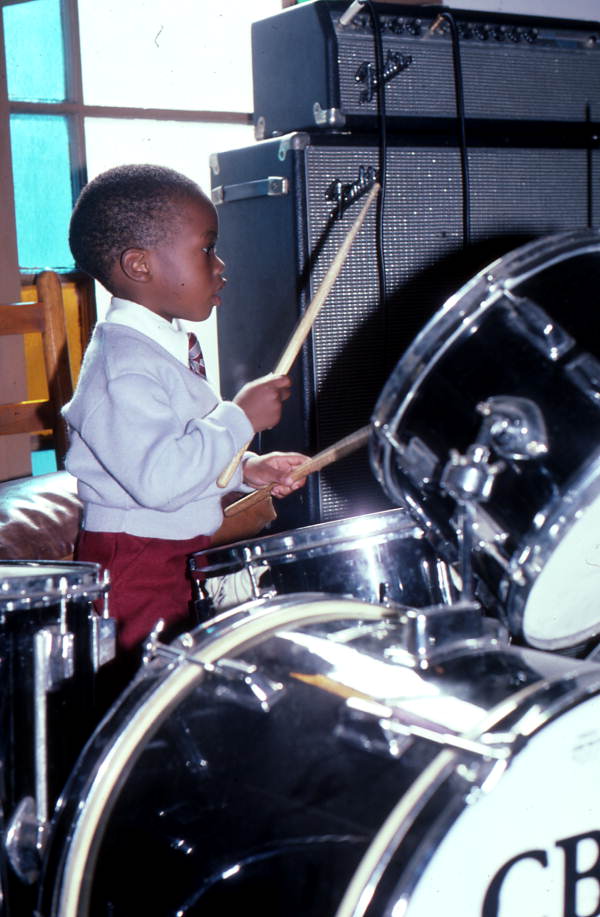 Boy playing drums at Pompey's Temple Church of God Through Christ - Hastings, Florida.