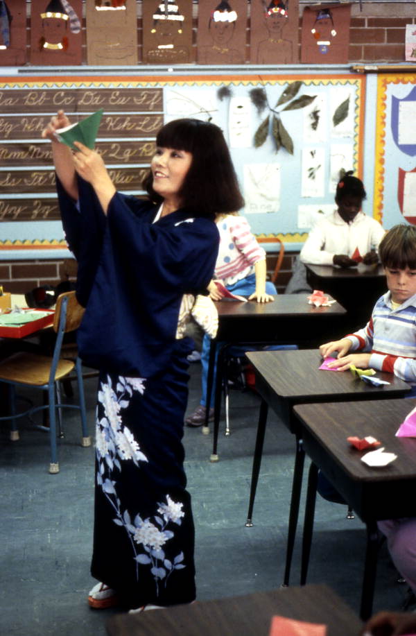 Yasuko Dawson making origami for students - Jacksonville, Florida.