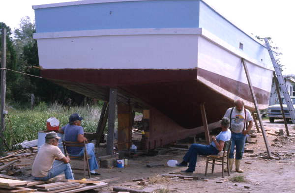 Thomas, Donald, and Charles Herrin with boat they are building - Jacksonville, Florida.