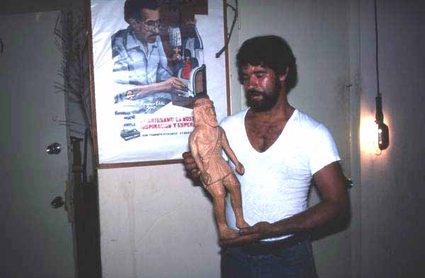 Jose Orta with a woodcarving - Miami, Florida