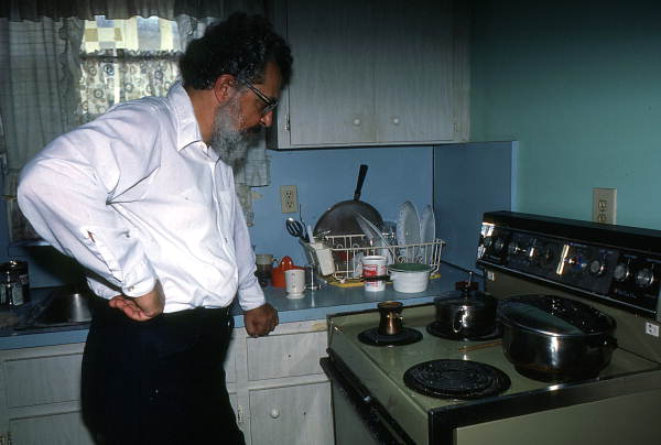 Father Elias, of St. Athanasius Church, making Greek coffee- Miami, Florida