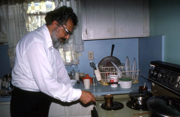 Father Elias, of St. Athanasius Church, making Greek coffee- Miami, Florida
