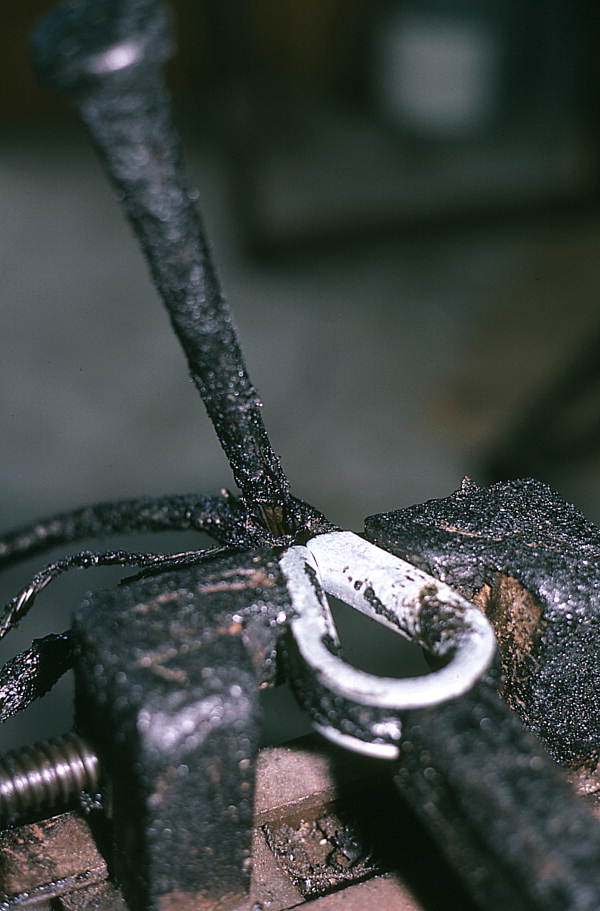 Detail of thimble in vice being spliced into cable - Eastpoint, Florida