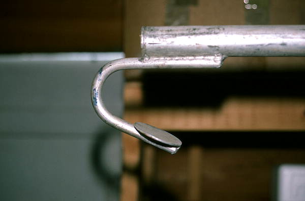 Detailed view of a net hook, showing the disk welded to the tip - Eastpoint, Florida