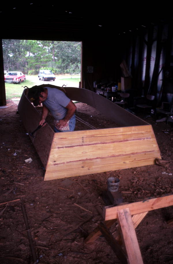 Bobby Shiver building an oyster skiff in his boat shop - Eastpoint, Florida