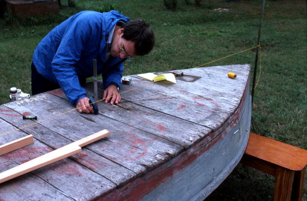 Ormond Loomis takes measurements of 12 foot "dinky" - Eastpoint, Florida