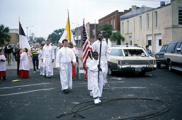 Clergymen and others proceed to blessing of fleet ceremony..