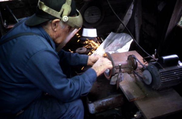 Loys Cain making an oyster knife - Eastpoint, Florida