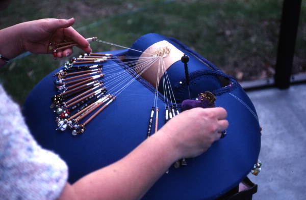 Lace bobbins being used by Marion Jones - Archer, Florida