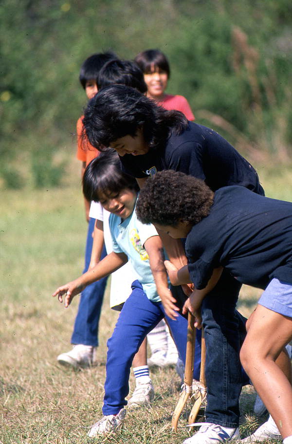 Seminole children playing stick ball - Big Cypress Reservation, Florida