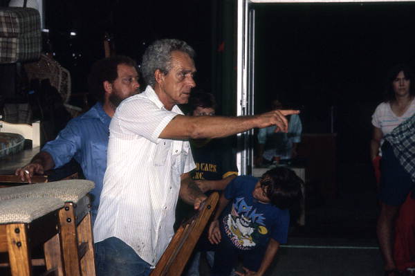 Furniture store personnel spotting bidders during auction - Jacksonville, Florida.
