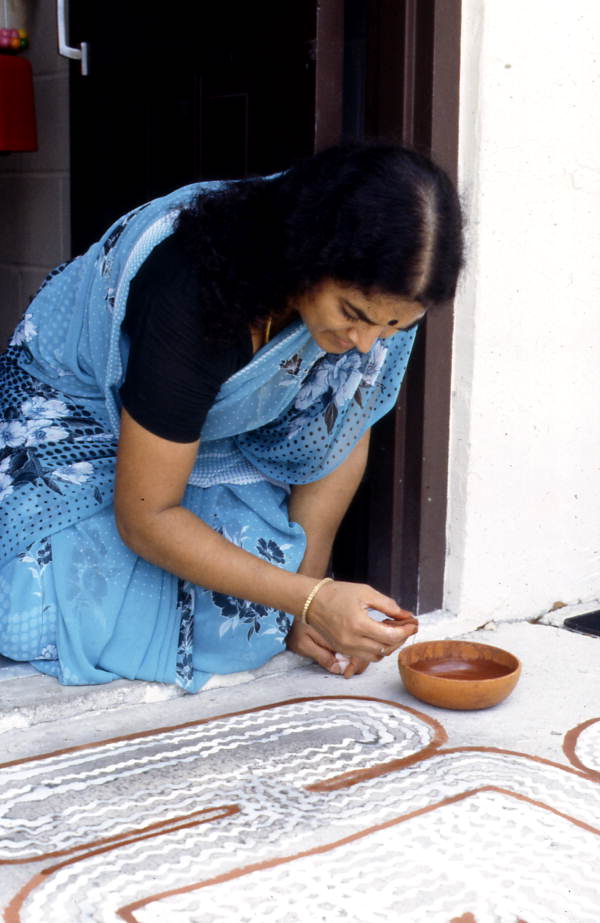 Prema Kuman making Kolam art - Jacksonville, Florida.