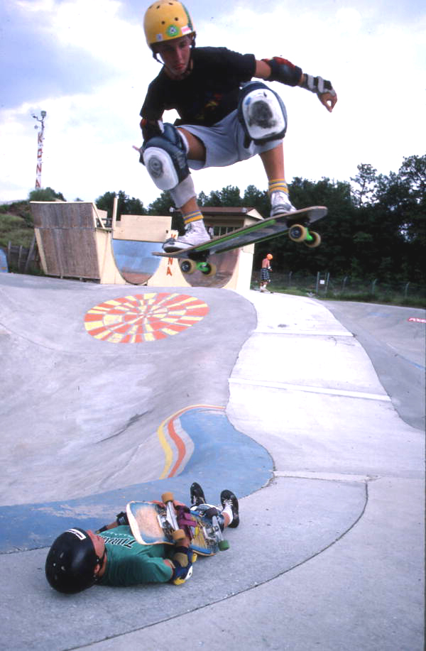 Unknown skateboarder jumps over another skateboarder - Jacksonville, Florida.