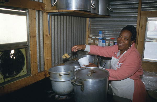Pleasant Jenkins serving pilau rice - Jacksonville, Florida