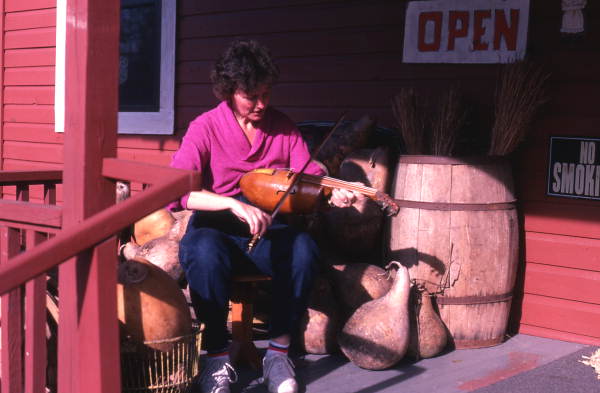 Linda Beth Waldron playing a gourd fiddle she made - White Springs, Florida