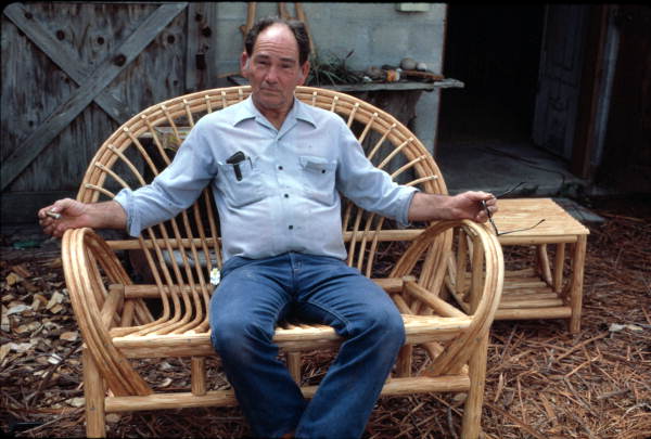 Robert Rudd sitting in a cypress chair he made - Lake Worth, Florida.