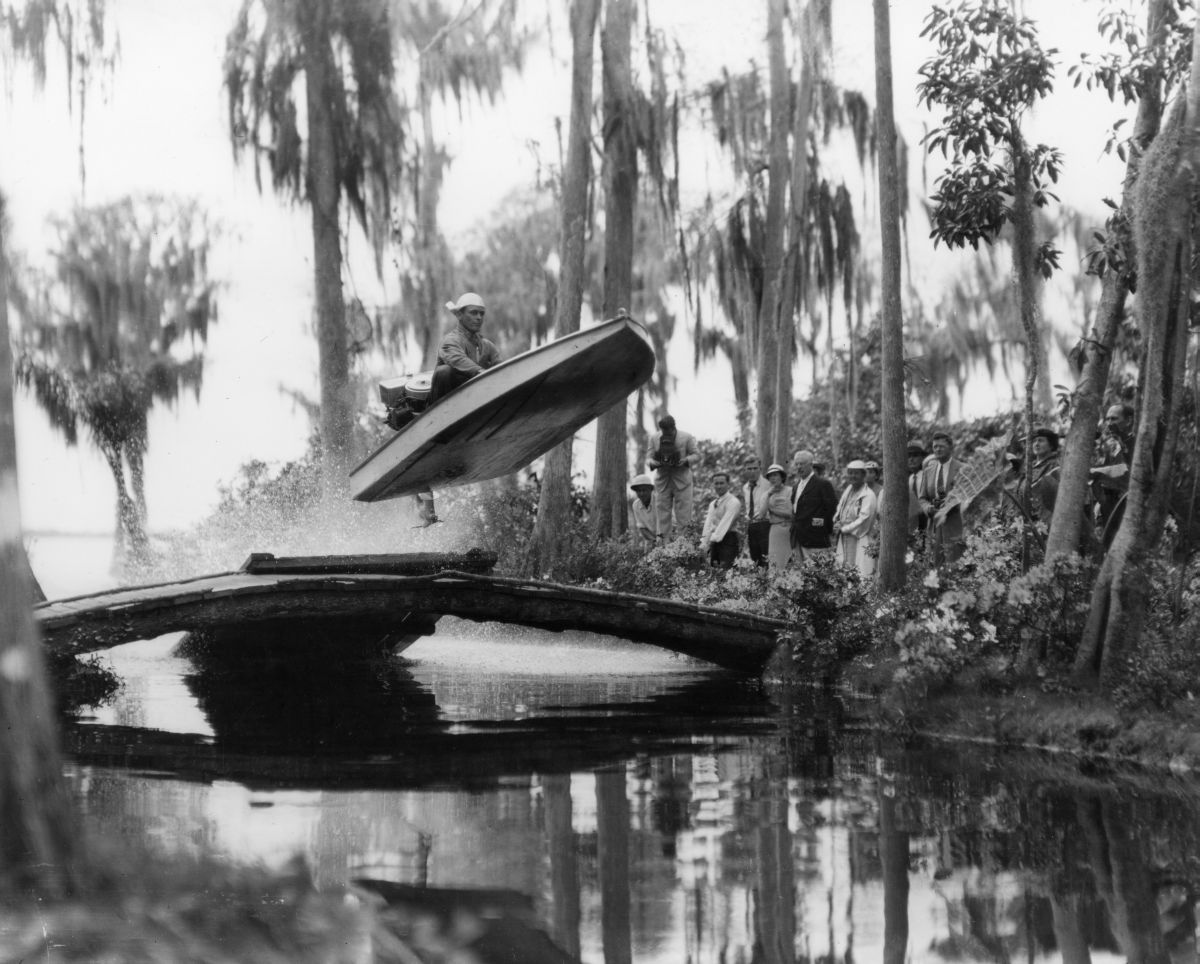 Bob Eastman stunt driving boat to the delight of spectators at Cypress Gardens.
