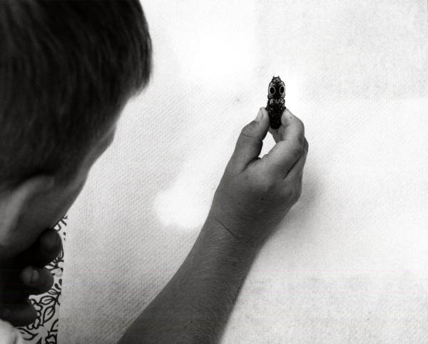 Scott Smith holding a click beetle.