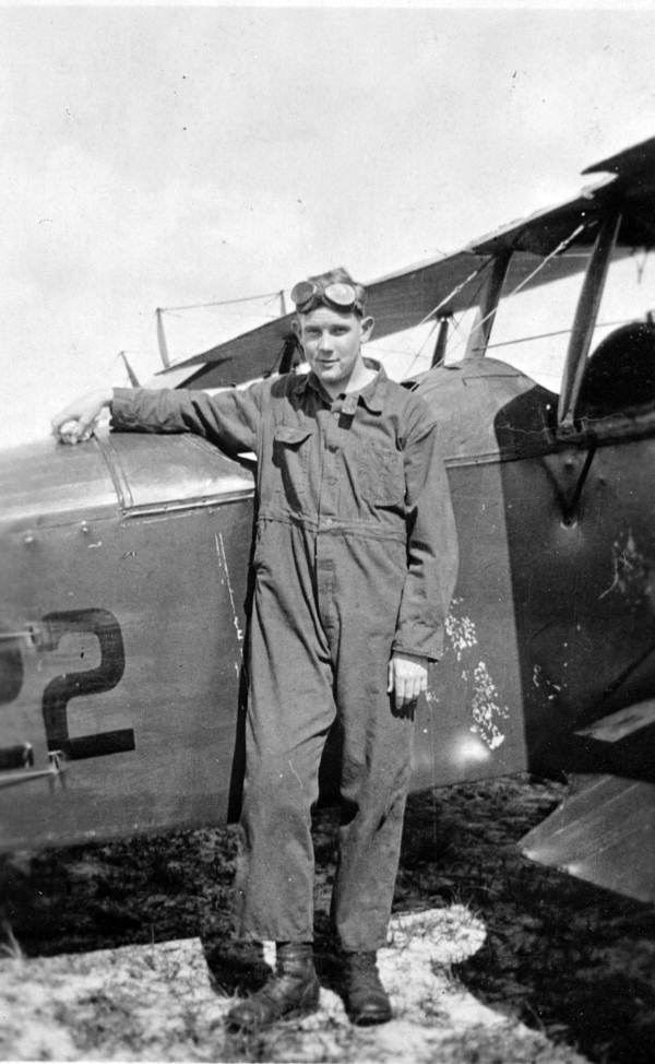 William Sydnon with plane at Carlstrom Field - Arcadia Region, Florida