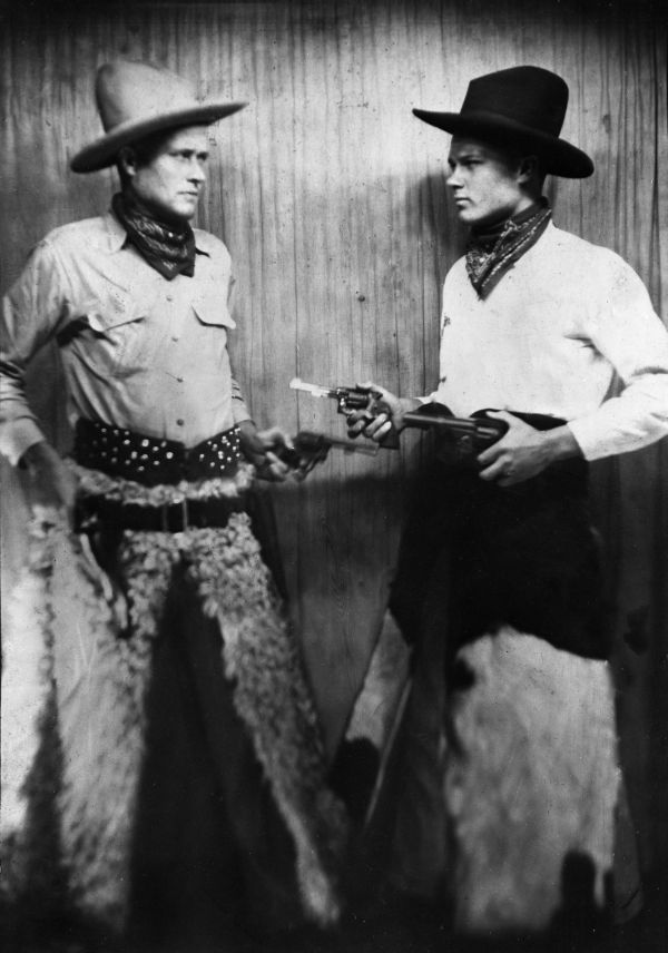 Men posed as cowboys at photo studio - Tampa, Florida
