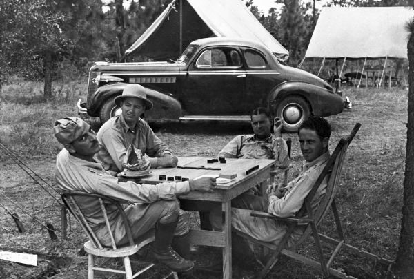 Florida National Guardsmen playing dominoes at camp