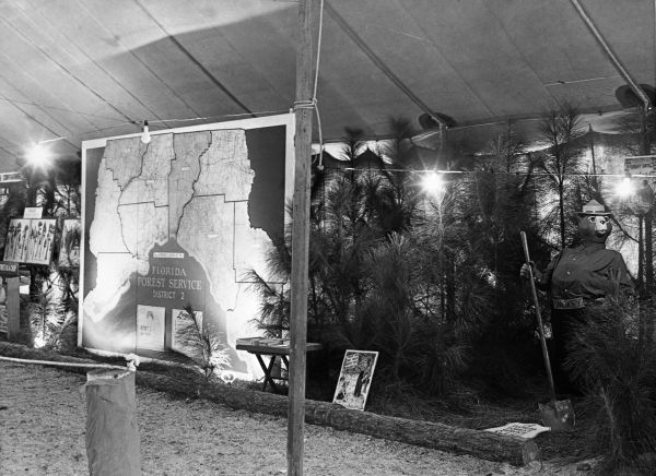 Florida Forest Service fair exhibit featuring Smokey the Bear