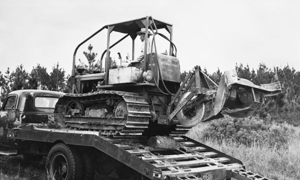 Florida Forest Service truck with International tractor and firelane plow